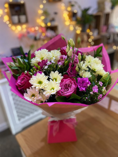 Princess Diaries - A beautiful handtied in water presented in a gift box, created using the fresh blooms of the day in pink and white with complementary foliage.